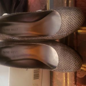 Nine west size 8M dark and light grey heels slightly used have two flaws in pic